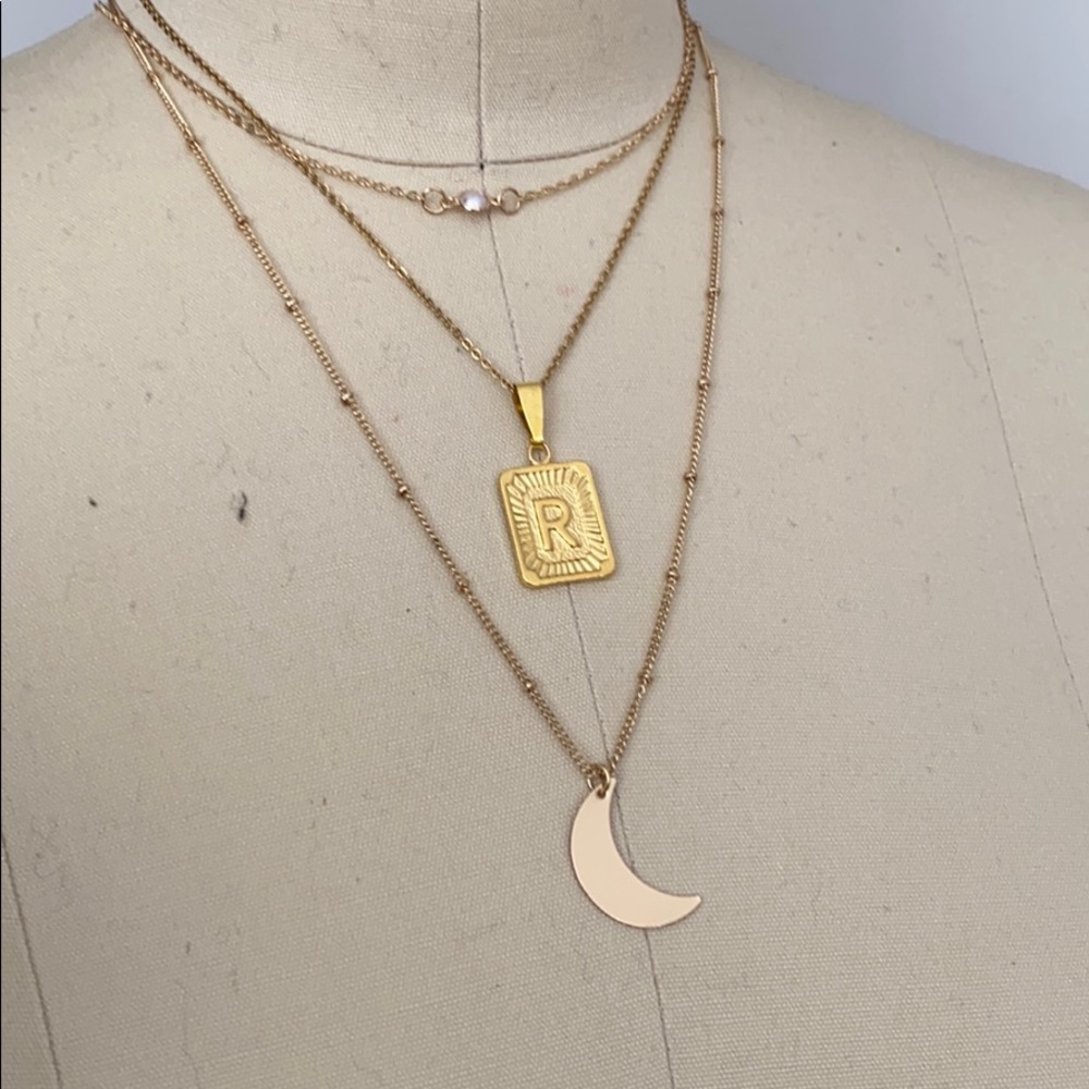 Initial necklace and moon in gold layering